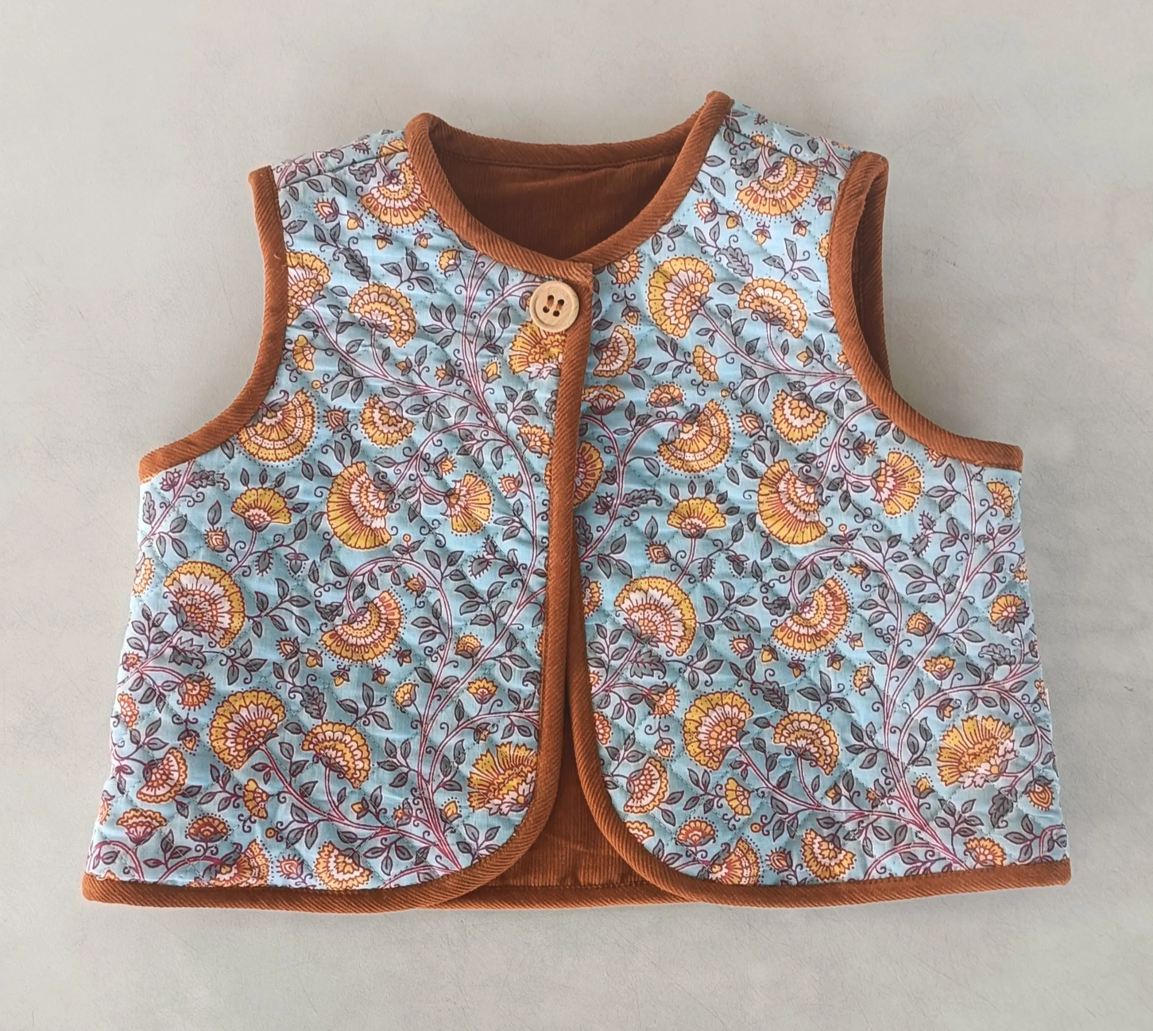 Reversible Rust Corduroy & Blue Floral Print Quilted Sleeveless Jacket